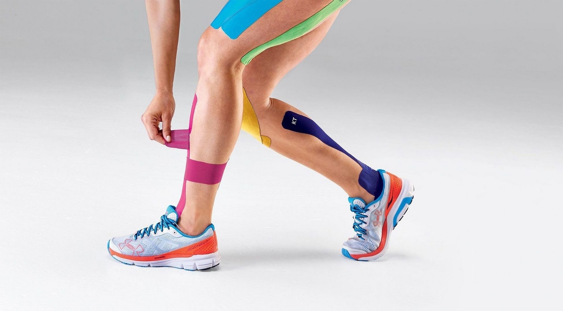 KT TAPE AN ELASTIC SPORTS TAPE DESIGNED TO RELIEVE PAIN WHILE
